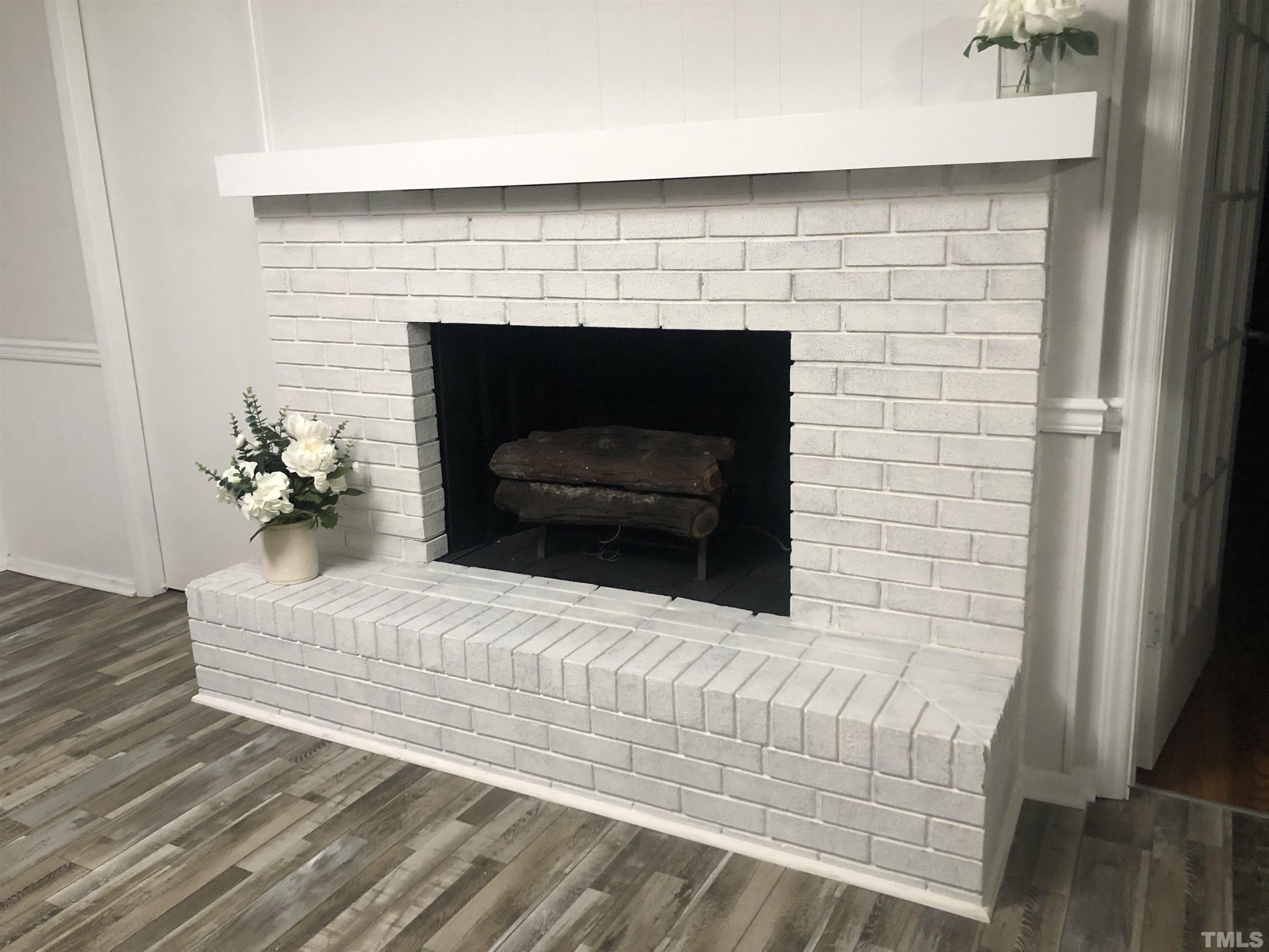 150 Community Drive Goldsboro, NC 27530 - Photo 11 of 30 a living room with furniture and a fireplace
