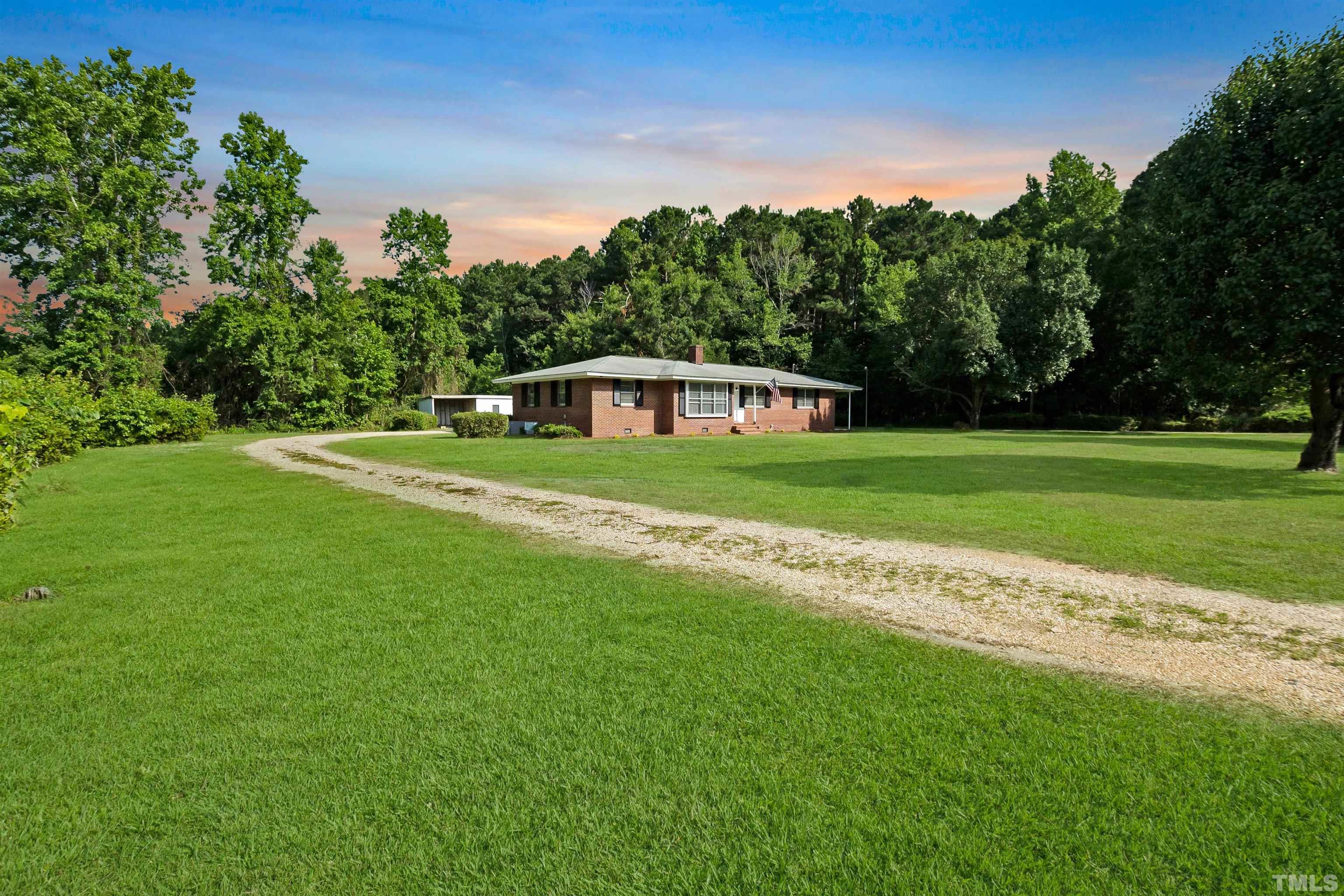150 Community Drive Goldsboro, NC 27530 - Photo 4 of 30 a view of an outdoor space and a yard