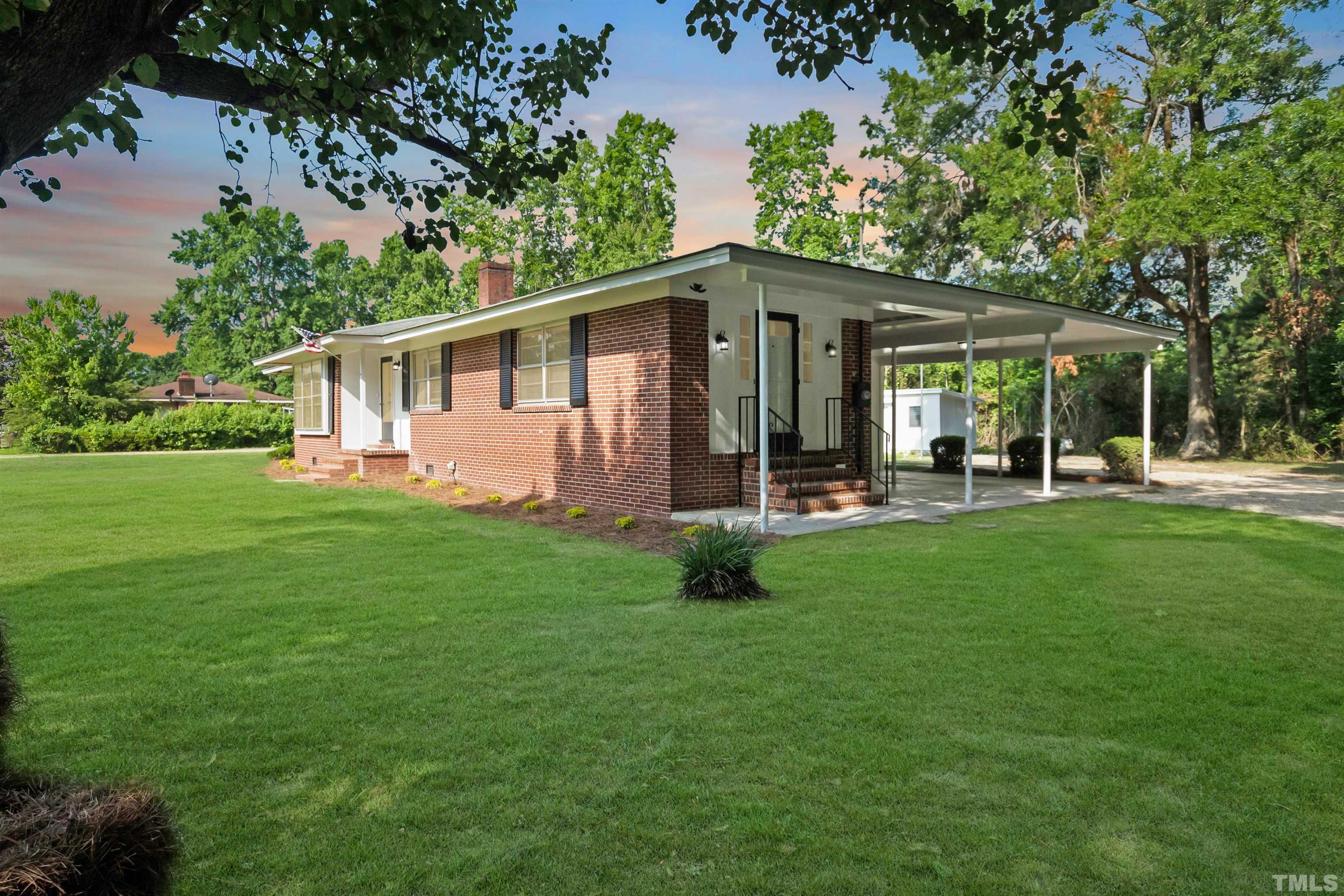 150 Community Drive Goldsboro, NC 27530 - Photo 6 of 30 a front view of house with yard and green space