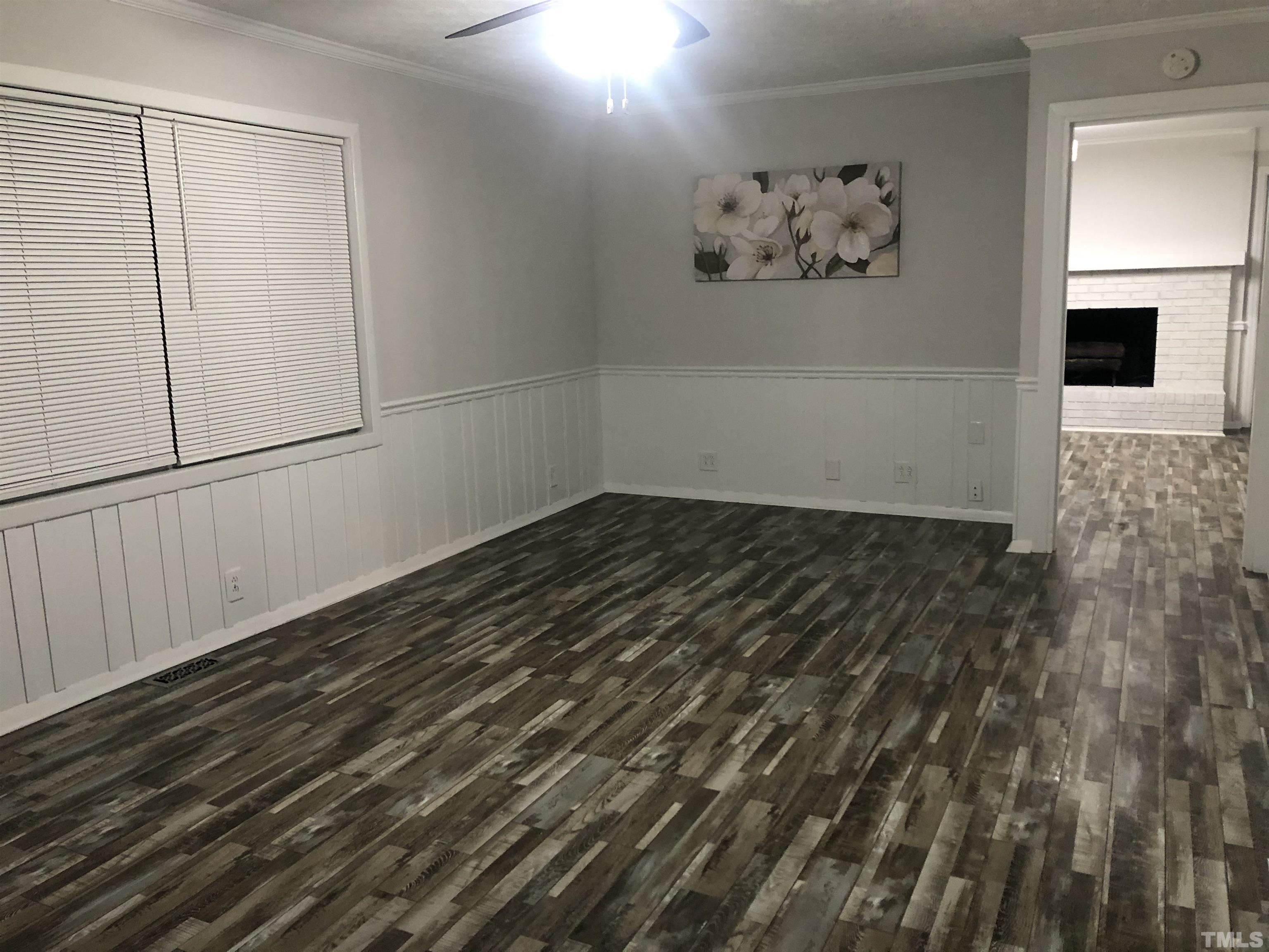 150 Community Drive Goldsboro, NC 27530 - Photo 8 of 30 a view of a room with wooden floor