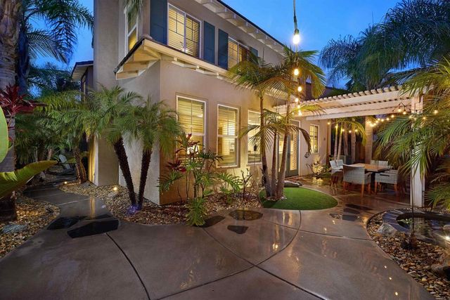 a view of a chairs and tables in the patio