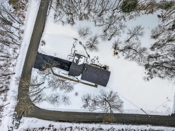 a view of a couches chair and wooden floor