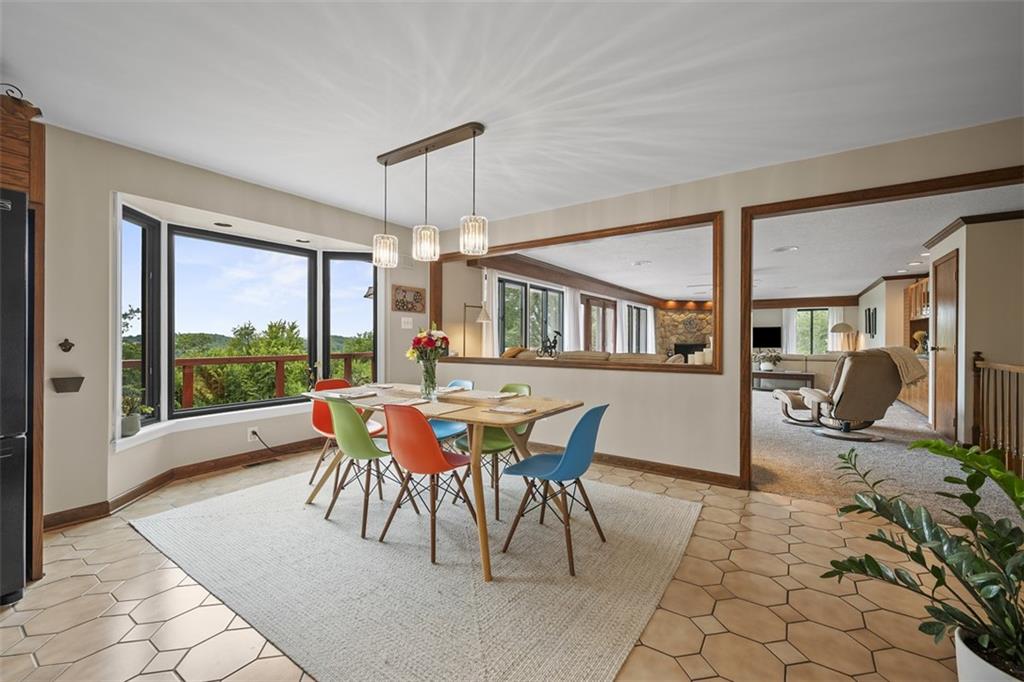 1000 Pleasant Hill Road Wexford, PA 15090 - Photo 5 of 37 a dining room with furniture and a floor to ceiling window