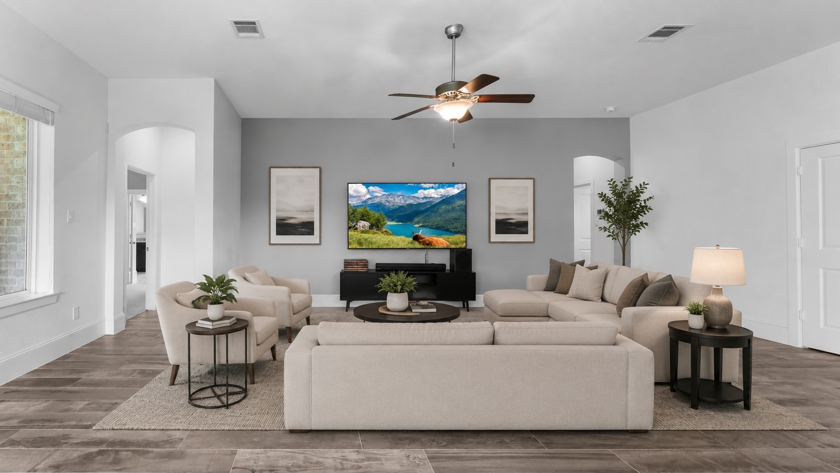 32001 Birch Briar Court Spring, TX 77386 - Photo 18 of 48 Beautifully staged family room featuring an open-concept design, abundant natural light, and plenty of space to relax or entertain guests. Virtually staged.