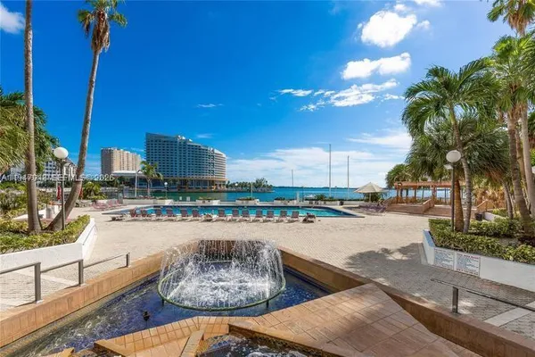 a view of a swimming pool with a terrace