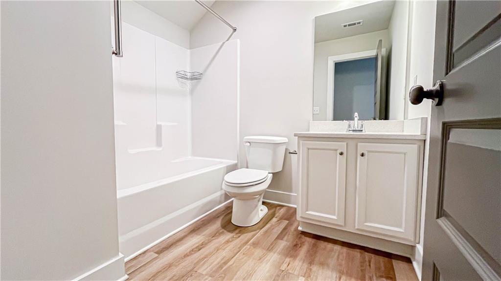 740 Eudora Welty Way Athens, GA 30607 - Photo 50 of 57 a bathroom with a toilet a sink and bathtub