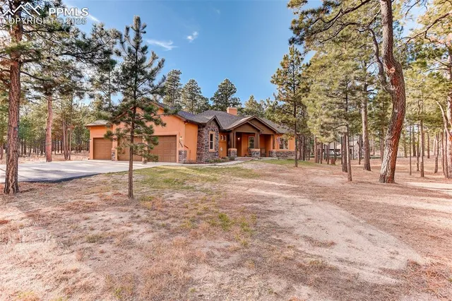 a house with trees in front of it