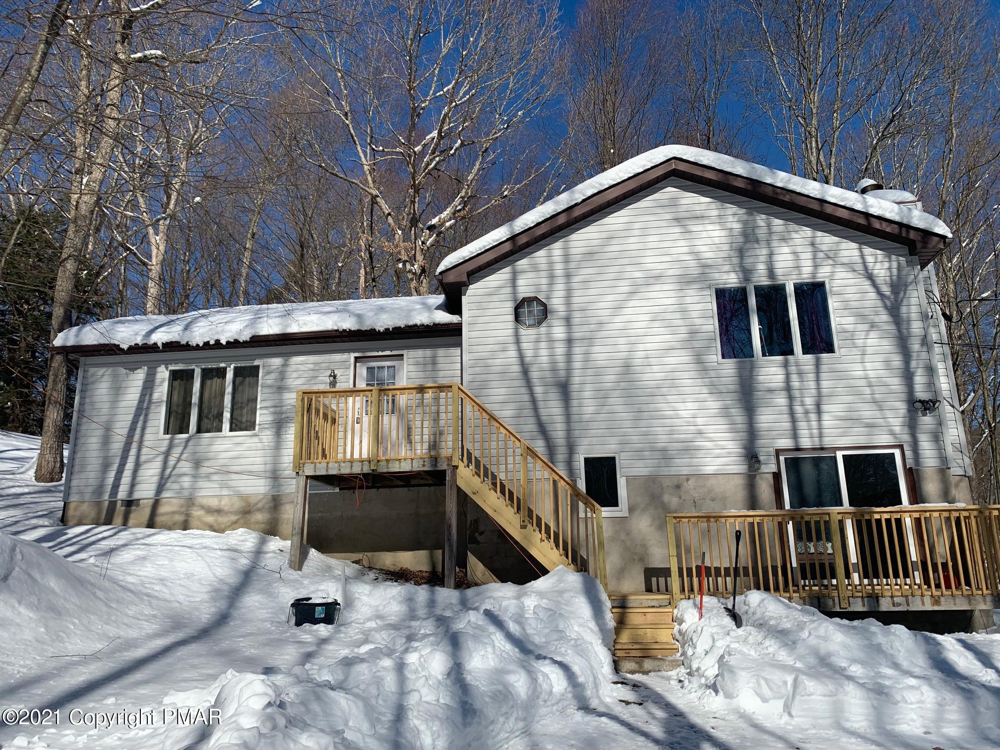 303 Otter Court Bushkill, PA 18324 - Photo 2 of 23 a view of a house with a yard