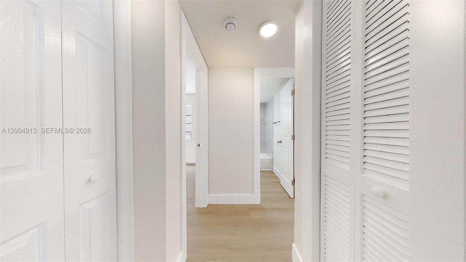 567 Southwest 3rd Street, Unit 2 Miami, FL 33130 - Photo 16 of 29 a view of a bathroom with a shower