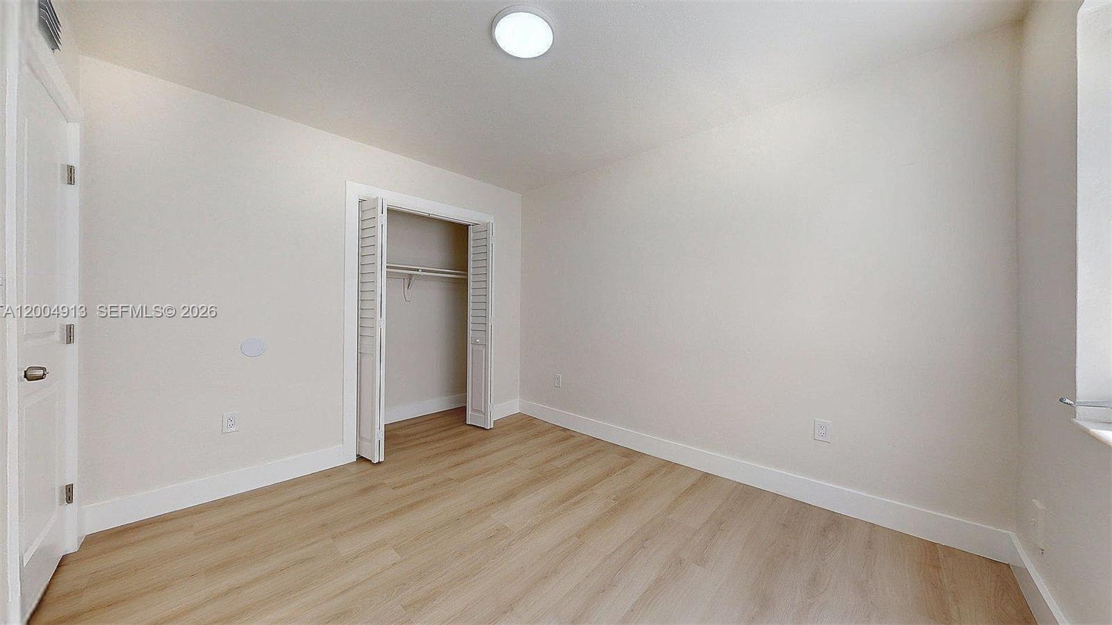 567 Southwest 3rd Street, Unit 2 Miami, FL 33130 - Photo 19 of 29 a view of an empty room