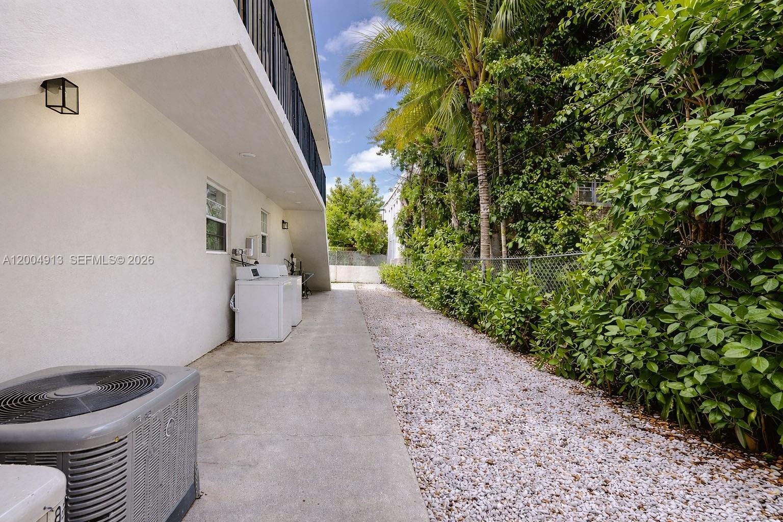 567 Southwest 3rd Street, Unit 2 Miami, FL 33130 - Photo 28 of 29 a view of a back yard of the house