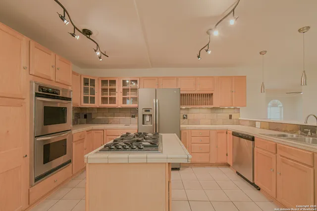 an empty room with a empty space and windows