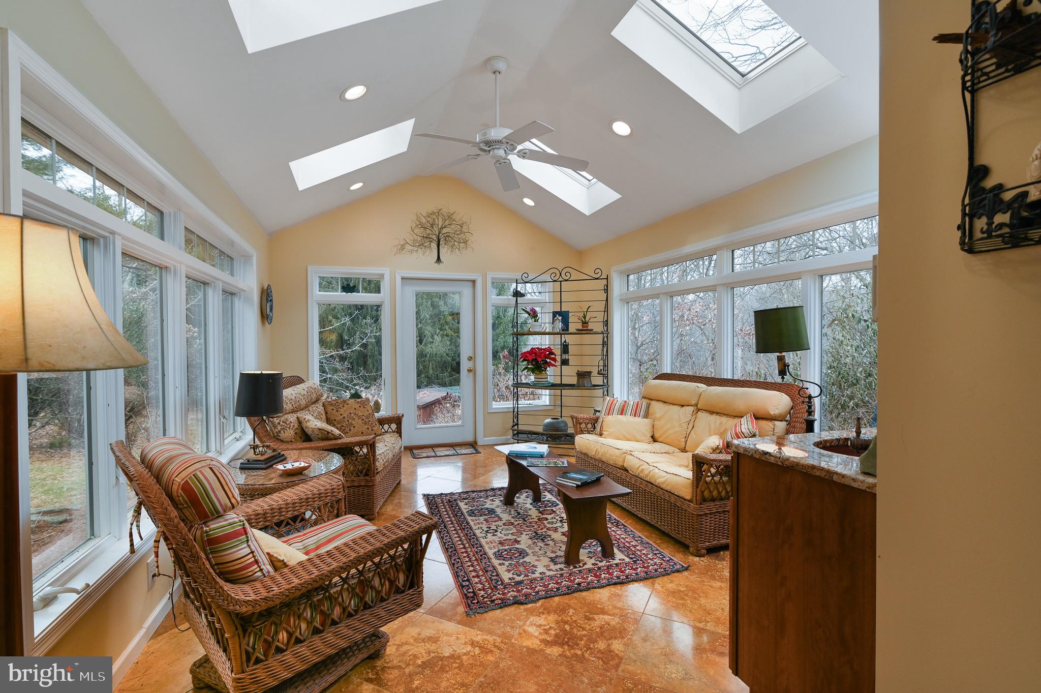 12 Phillips Lane Chester Springs, PA 19425 - Photo 21 of 54 a living room with furniture fireplace and a large window
