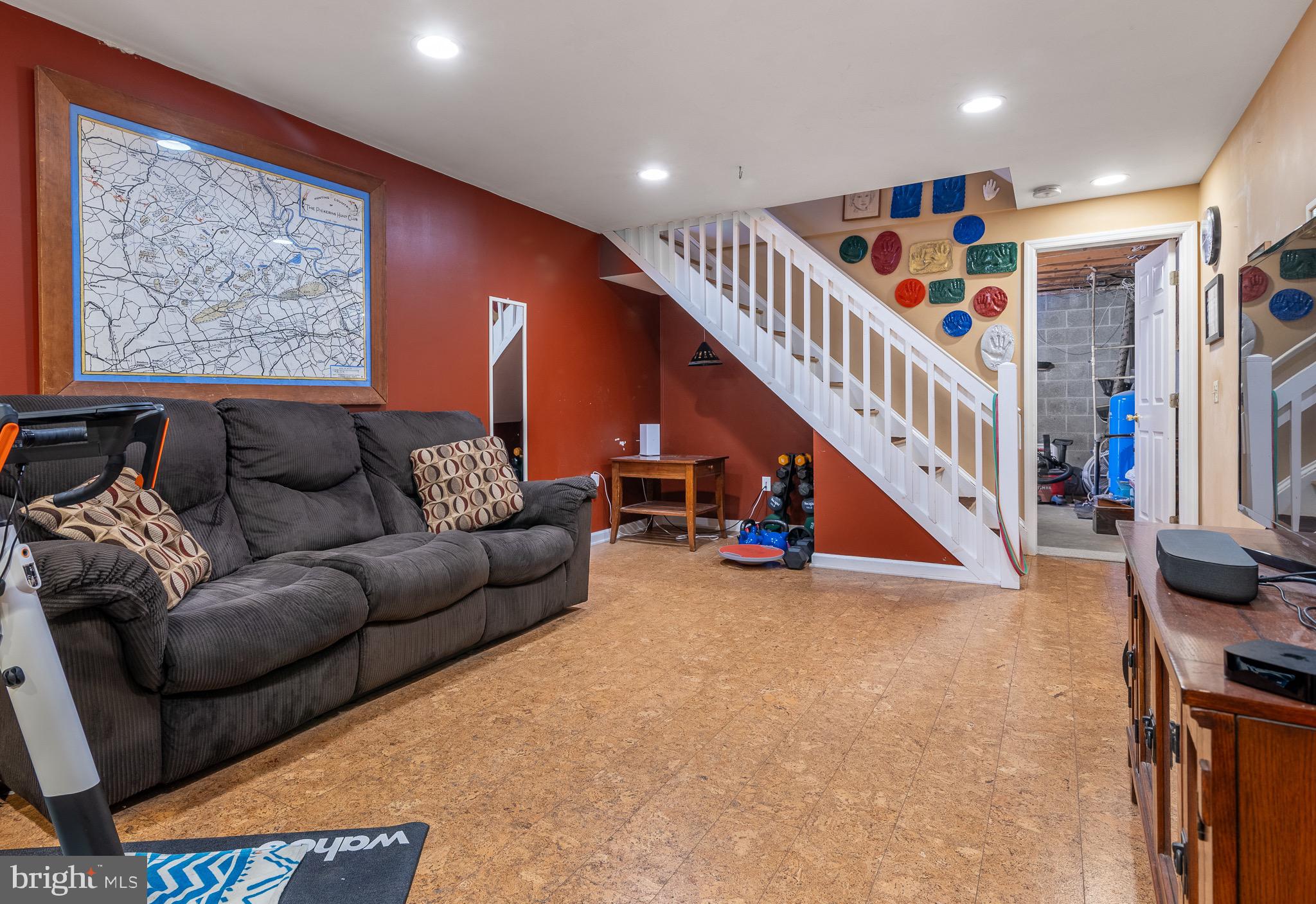 12 Phillips Lane Chester Springs, PA 19425 - Photo 38 of 54 a living room with furniture and stairs