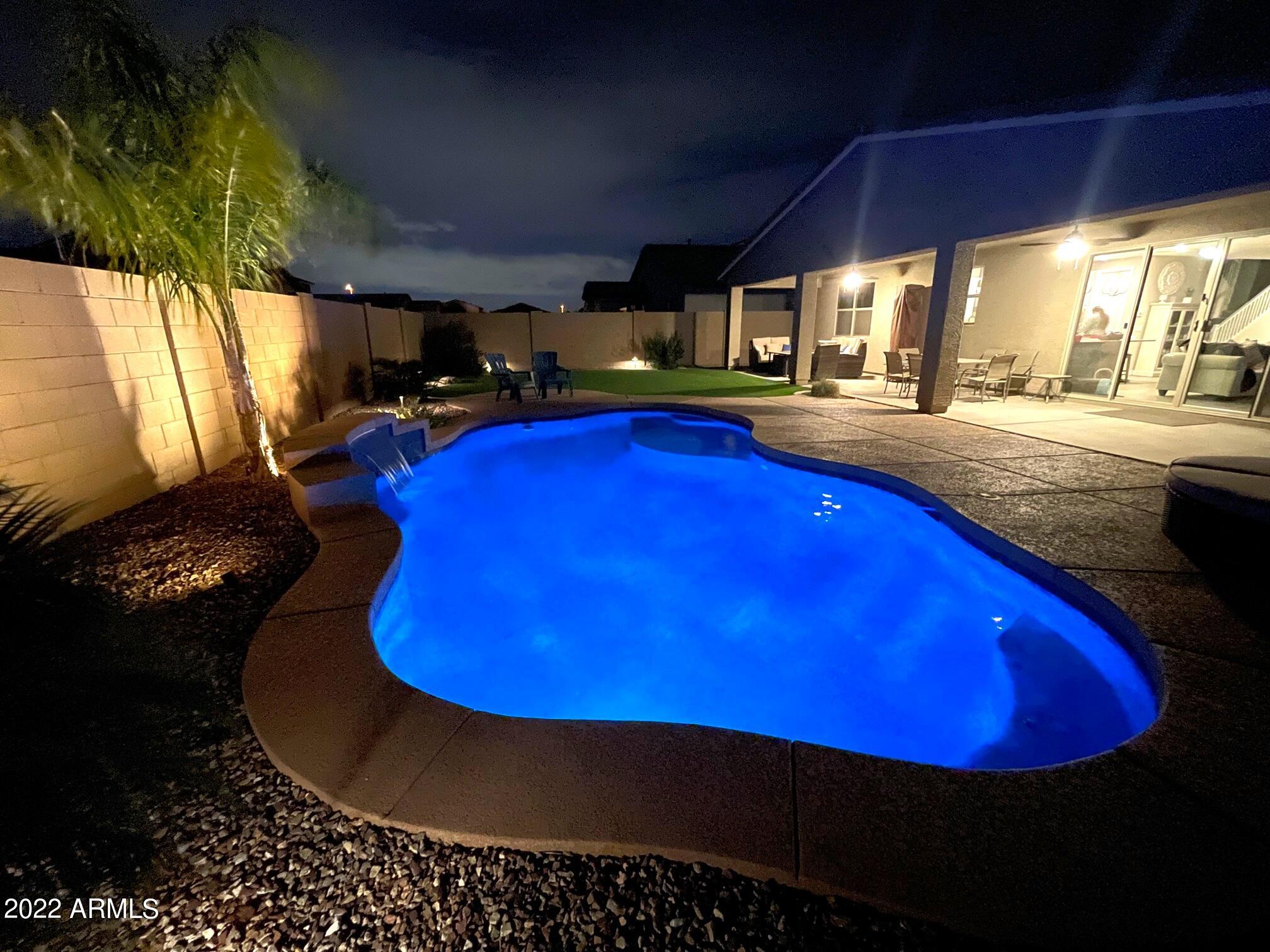 3330 West Fremont Rd. Phoenix, AZ 85041 - Photo 39 of 43 a view of a swimming pool with chairs