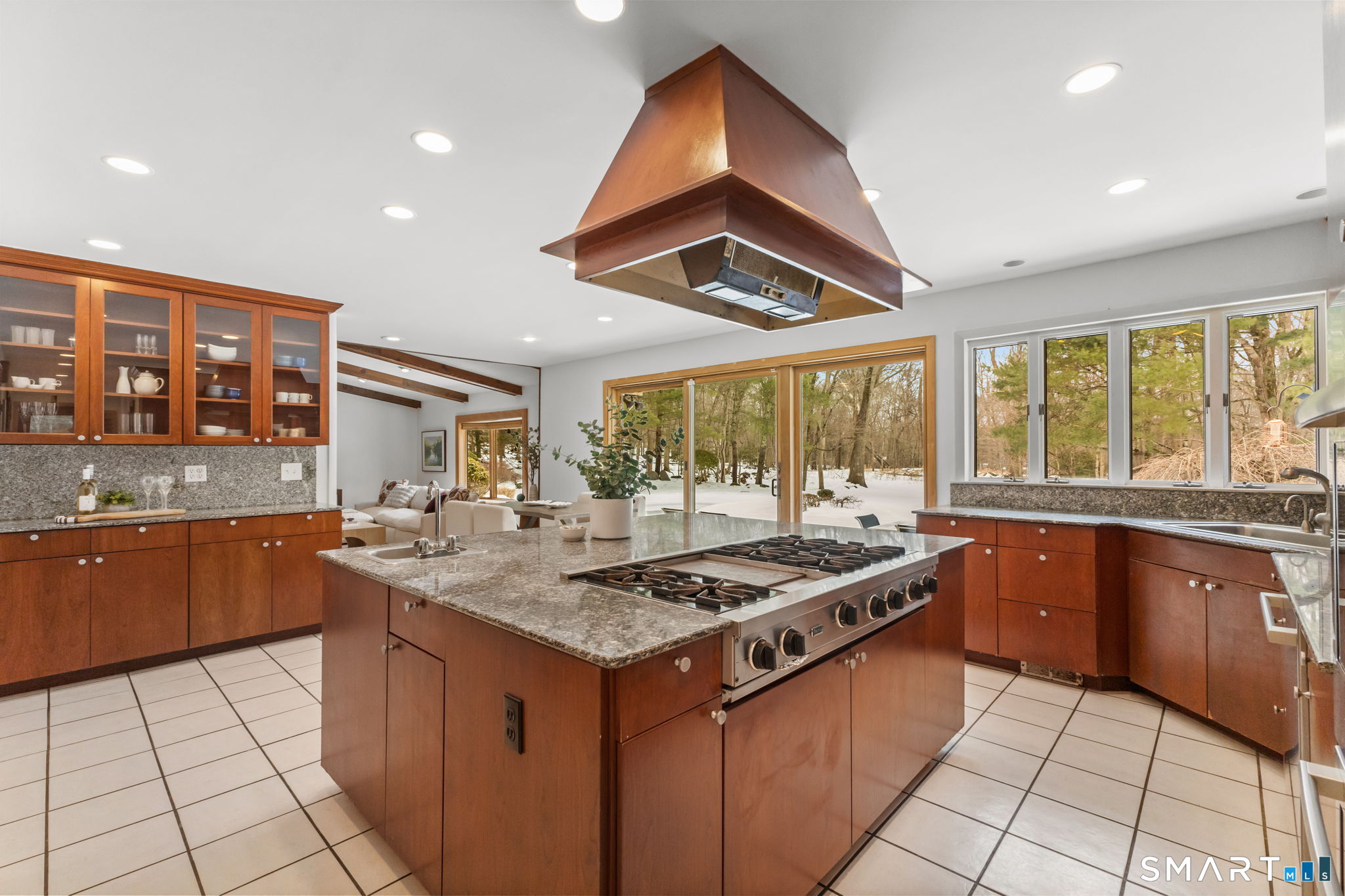 37 Quarry Road Stamford, CT 06903 - Photo 11 of 41 a kitchen with stainless steel appliances granite countertop a stove a sink and a refrigerator