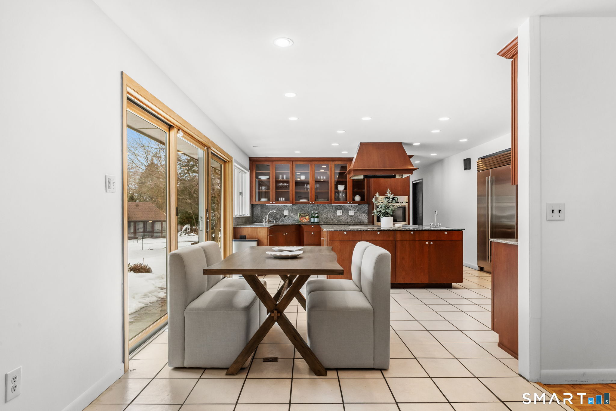 37 Quarry Road Stamford, CT 06903 - Photo 12 of 41 a view of a dining room with furniture window and outside view