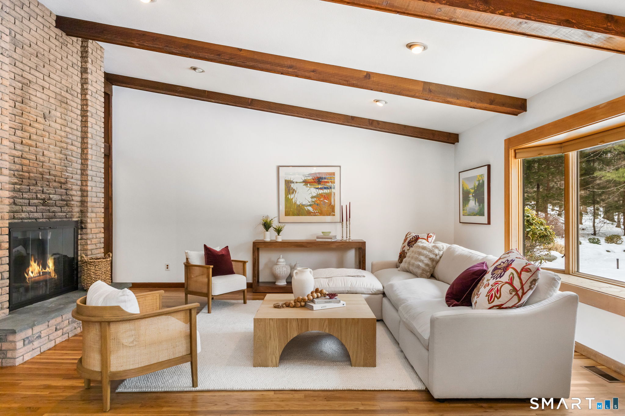 37 Quarry Road Stamford, CT 06903 - Photo 14 of 41 a living room with furniture and a fireplace