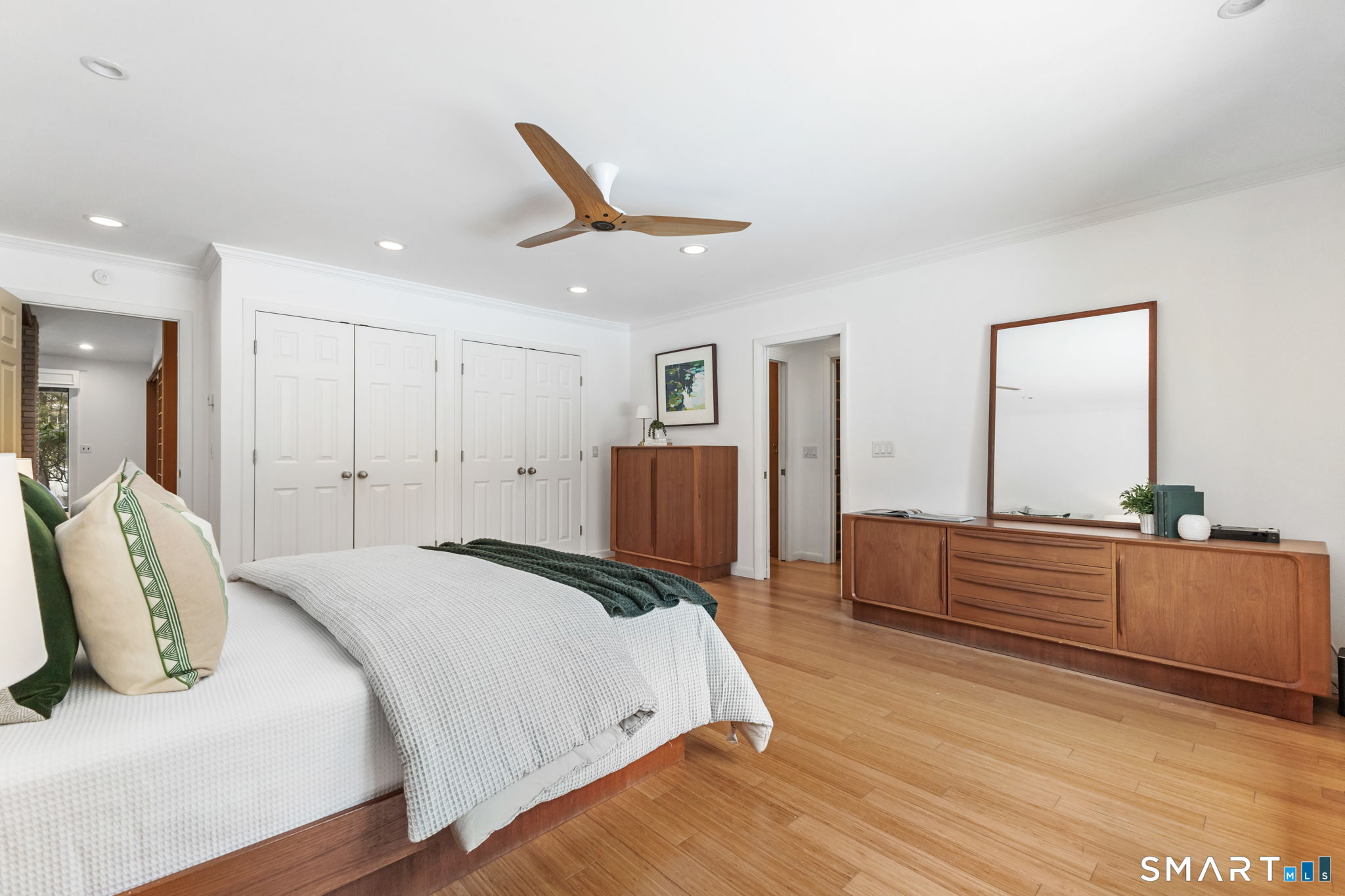 37 Quarry Road Stamford, CT 06903 - Photo 17 of 41 a spacious bedroom with a bed and a dresser