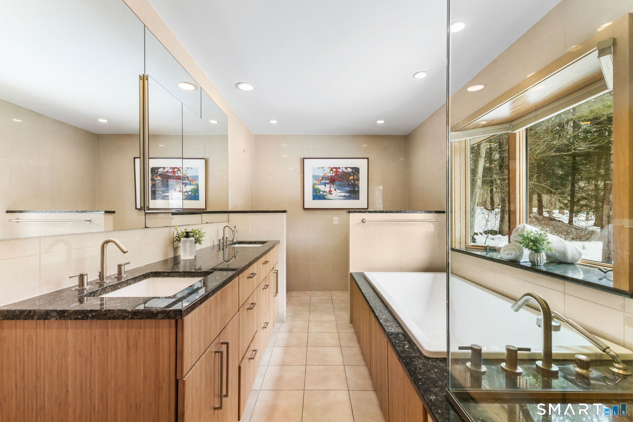 37 Quarry Road Stamford, CT 06903 - Photo 18 of 41 a bathroom with a granite countertop sink and a large mirror