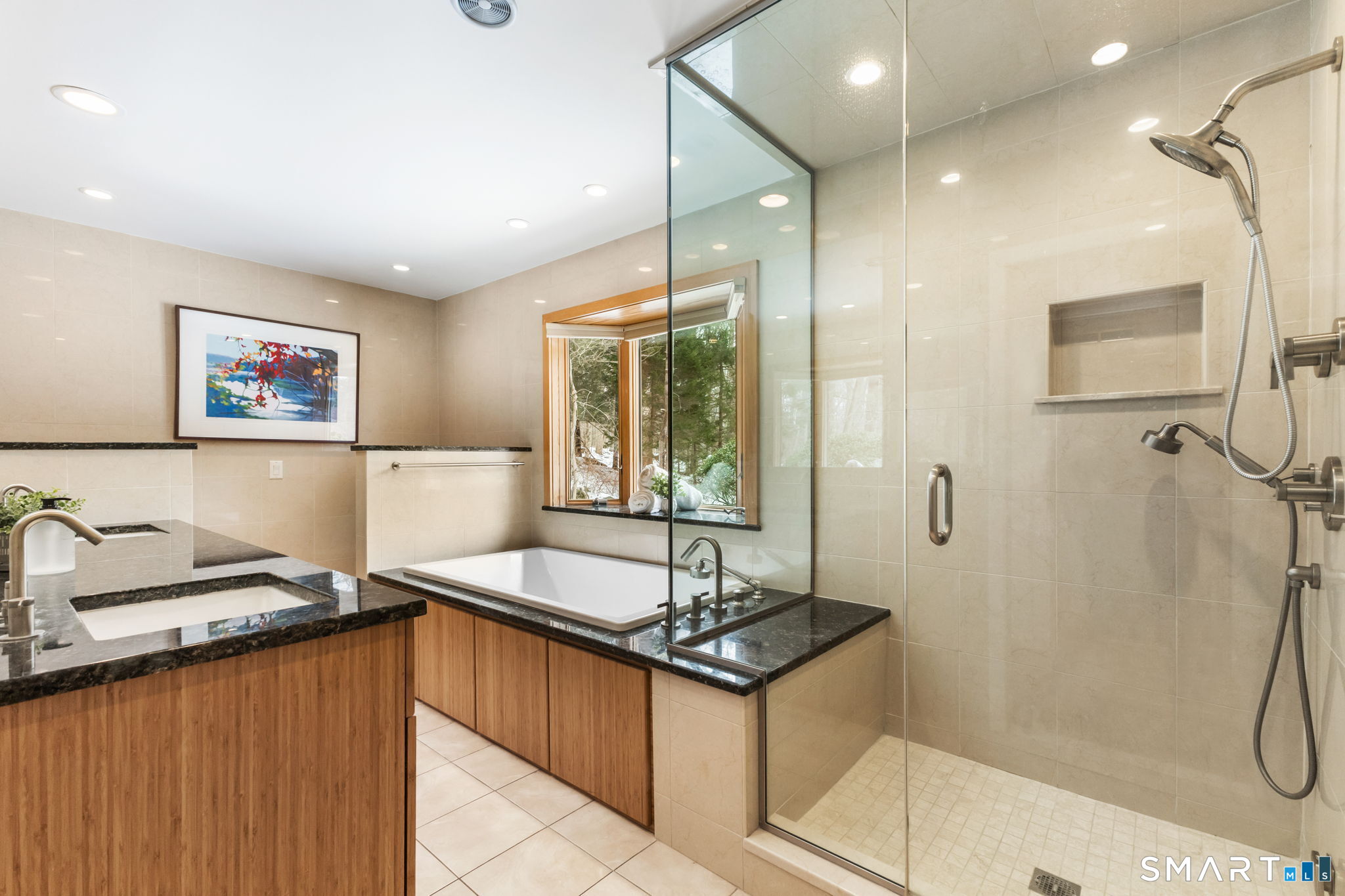 37 Quarry Road Stamford, CT 06903 - Photo 19 of 41 a bathroom with a granite countertop sink mirror and a shower