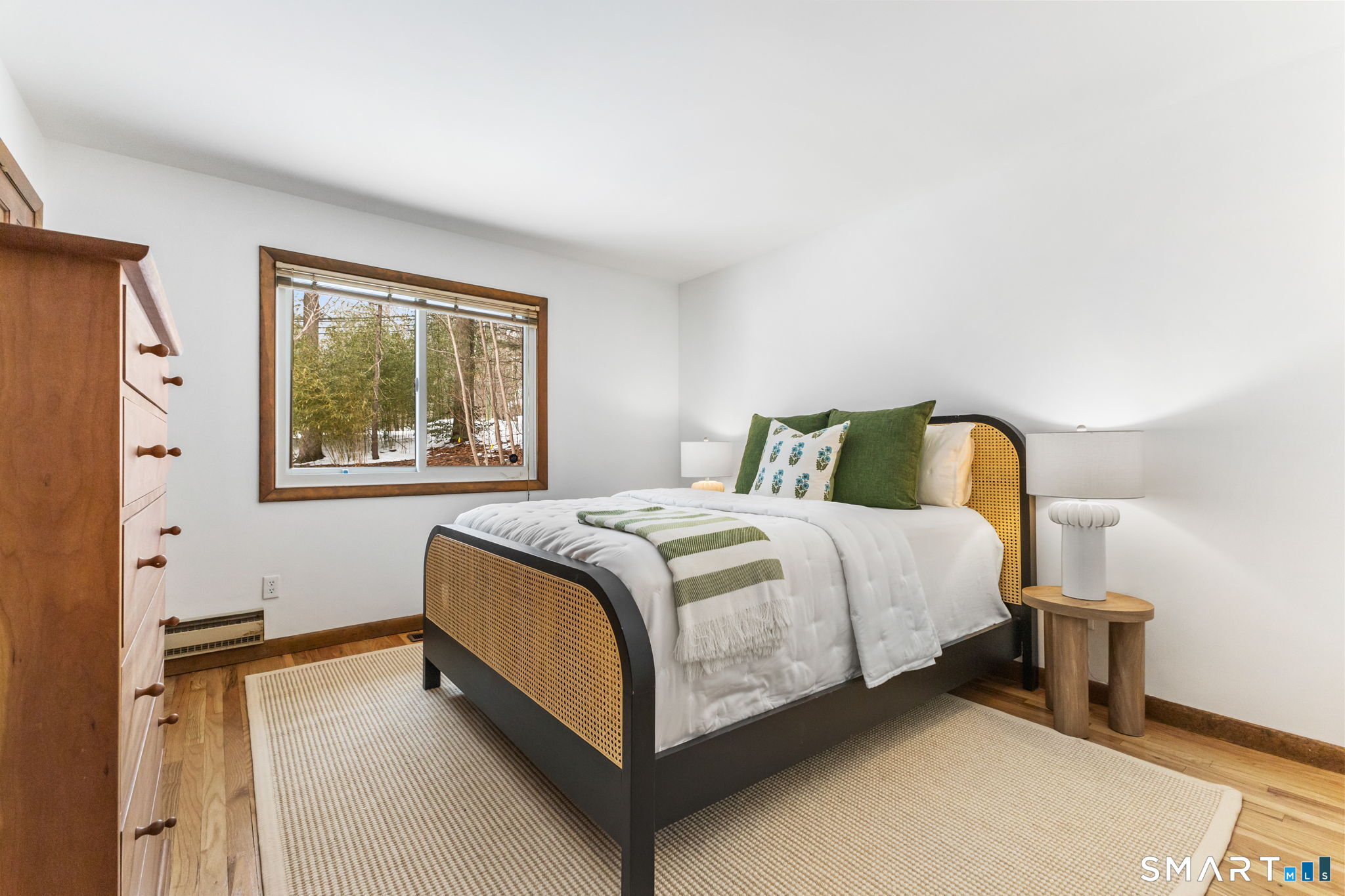 37 Quarry Road Stamford, CT 06903 - Photo 23 of 41 a bedroom with a bed and a window