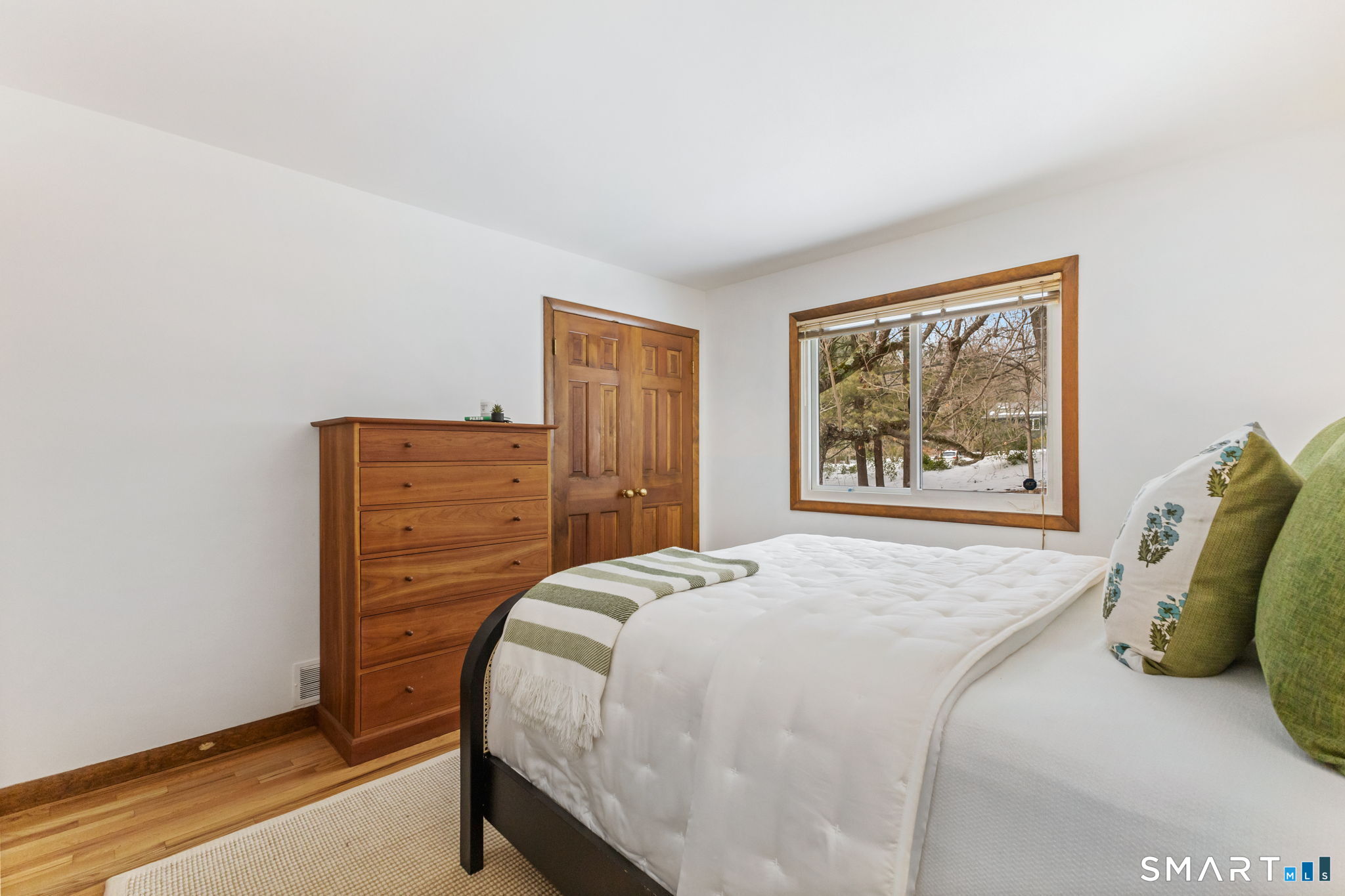 37 Quarry Road Stamford, CT 06903 - Photo 24 of 41 a bedroom with a bed and a cabinets