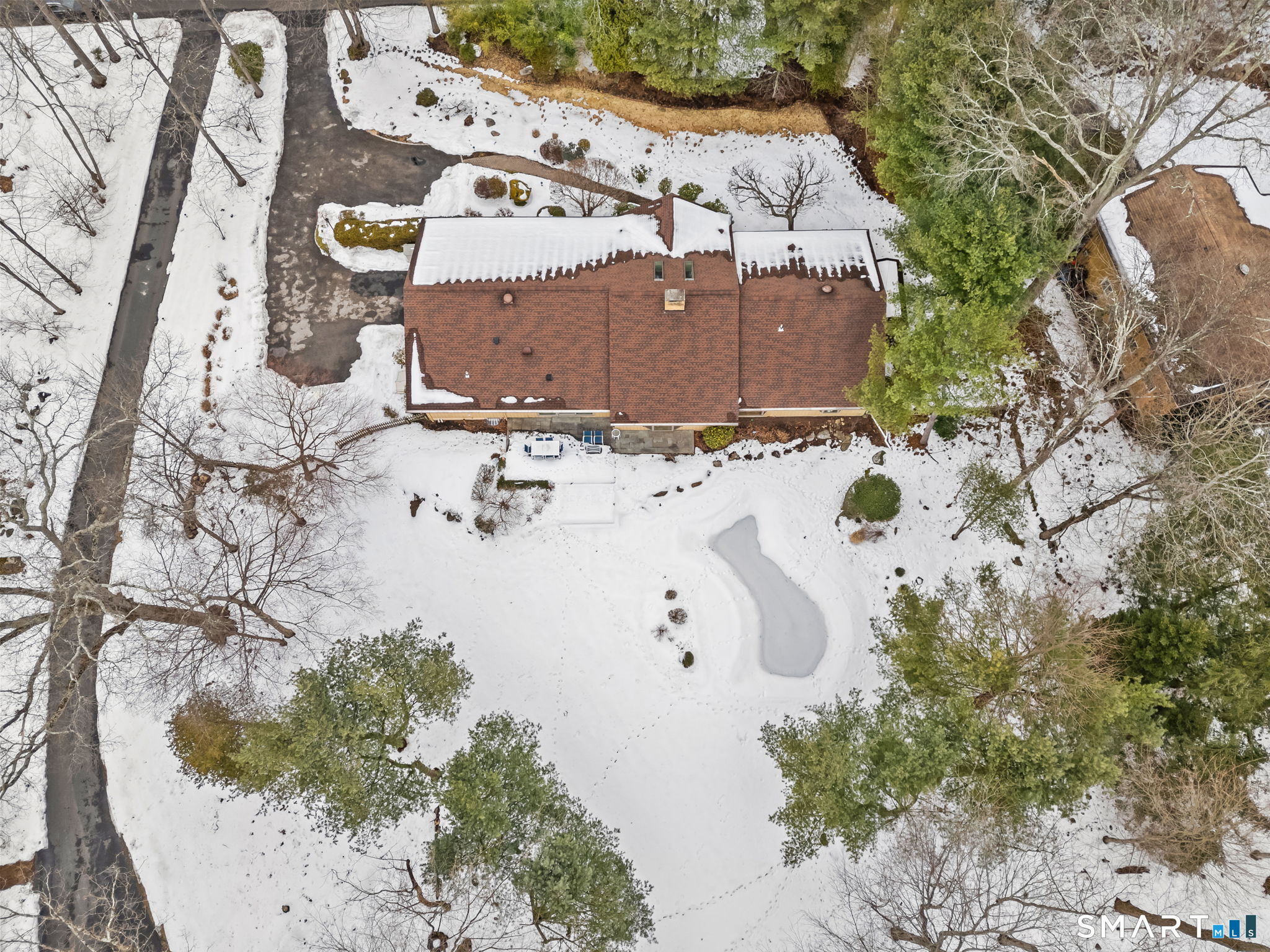 37 Quarry Road Stamford, CT 06903 - Photo 3 of 41 an aerial view of a house with a yard