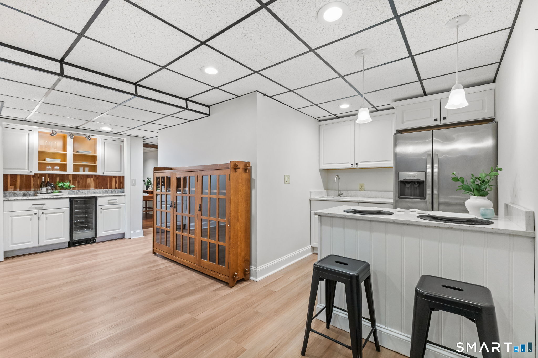 37 Quarry Road Stamford, CT 06903 - Photo 29 of 41 a kitchen with stainless steel appliances a sink and stove top oven