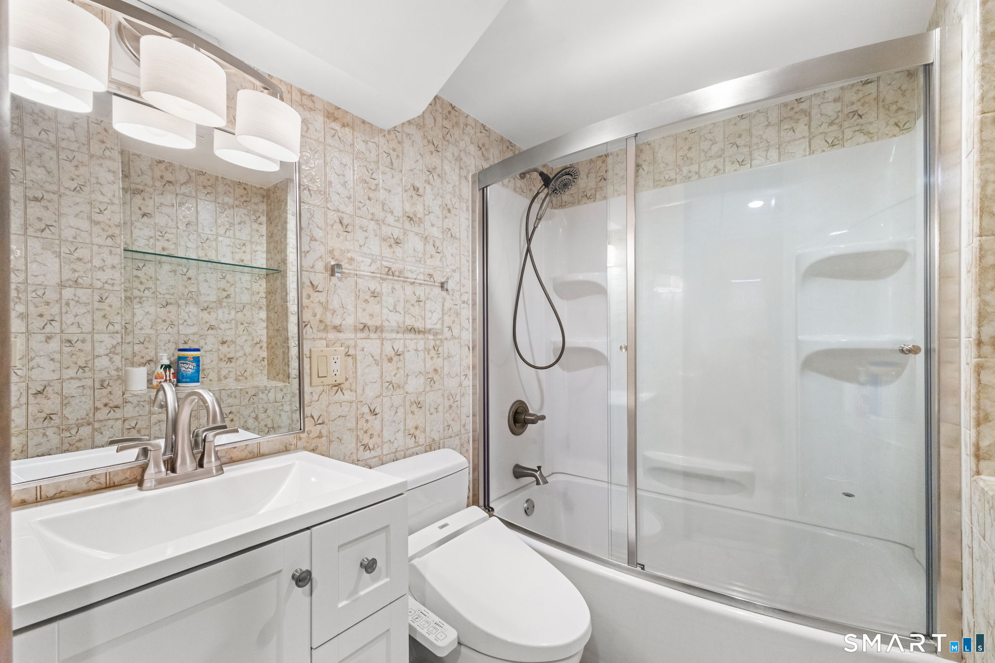 37 Quarry Road Stamford, CT 06903 - Photo 32 of 41 a bathroom with a sink toilet and shower