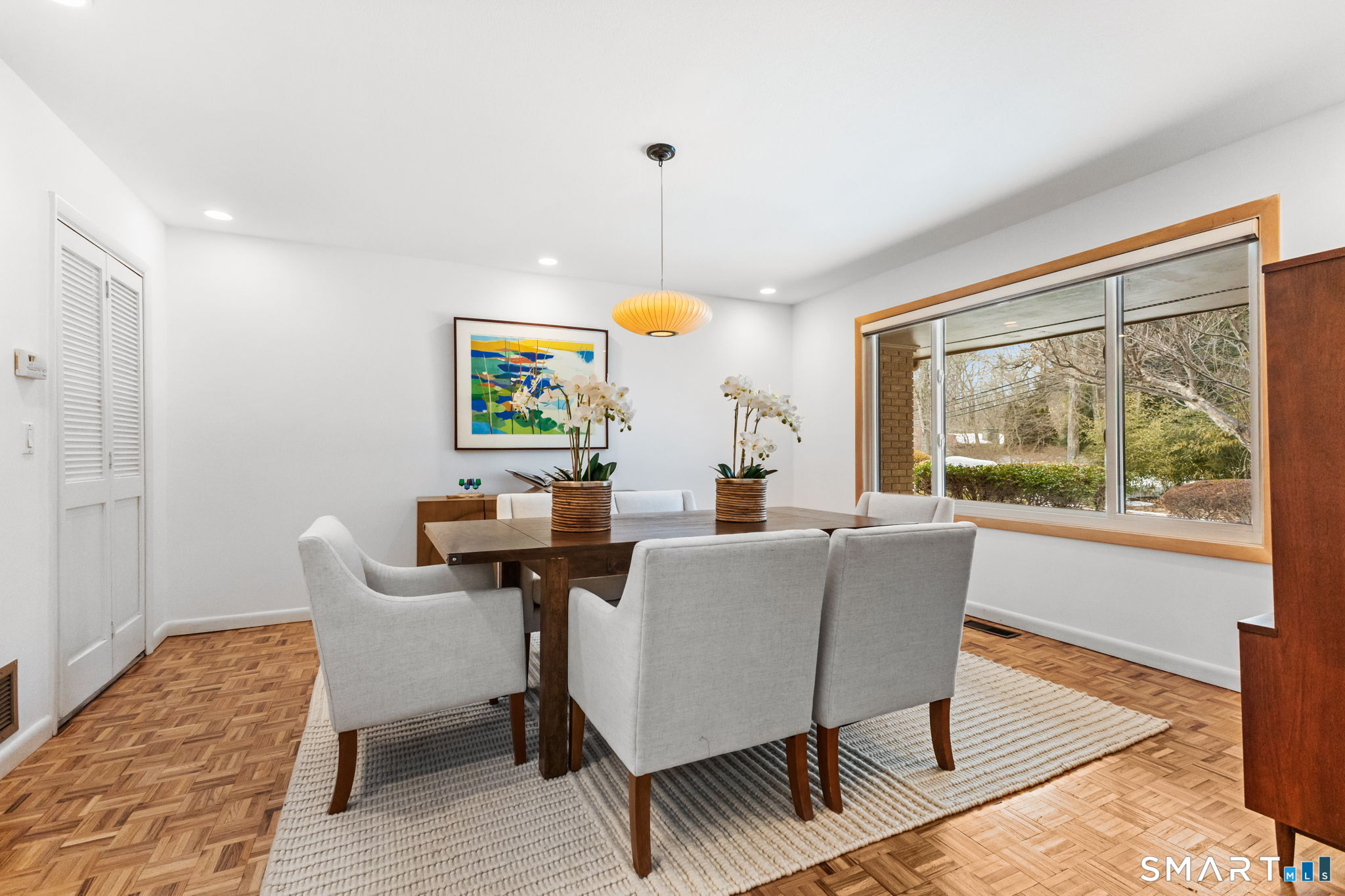 37 Quarry Road Stamford, CT 06903 - Photo 6 of 41 a view of a dining room with furniture window and wooden floor