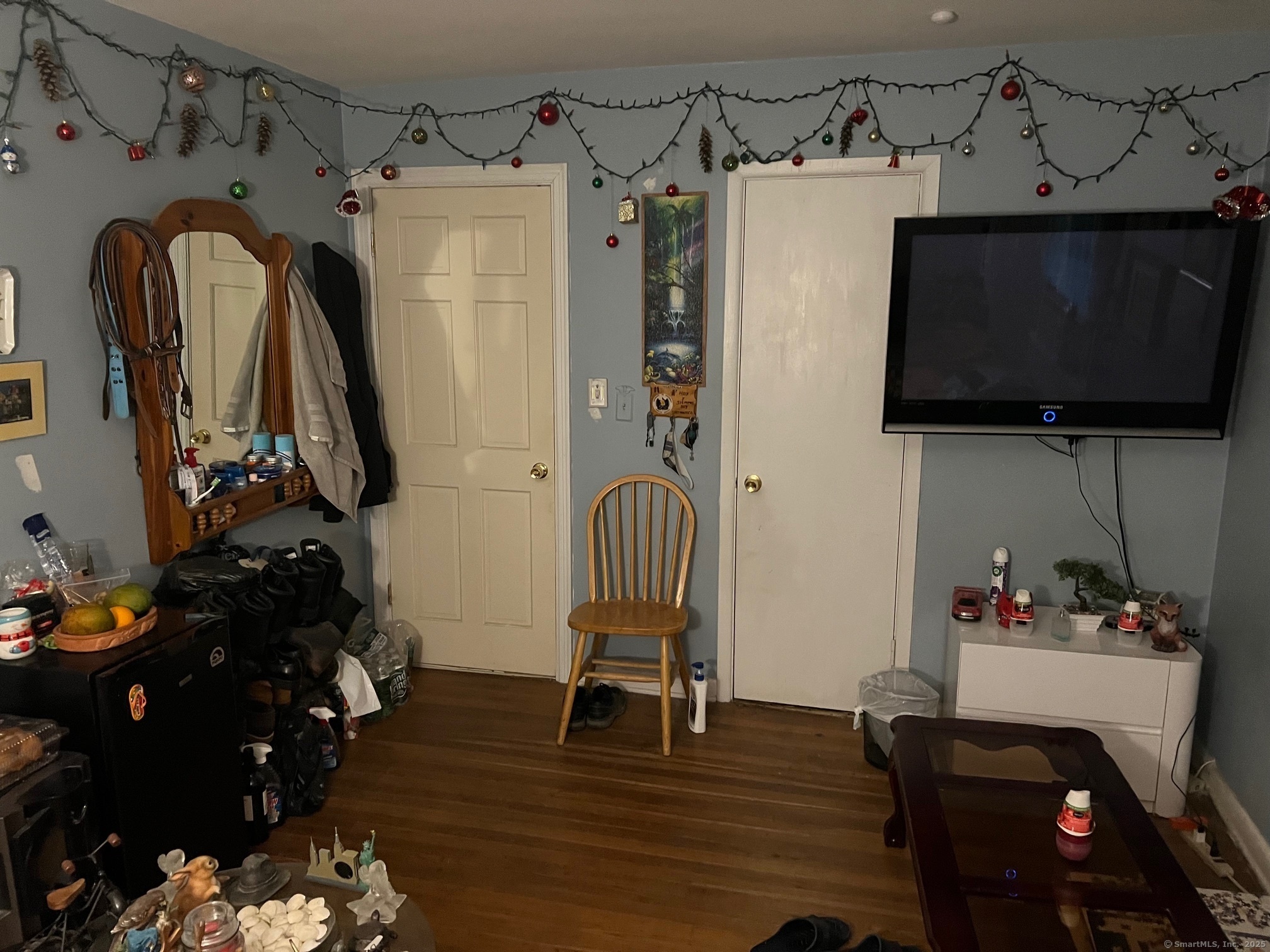 95 Frederick Street Stamford, CT 06902 - Photo 14 of 30 a living room with furniture and a flat screen tv