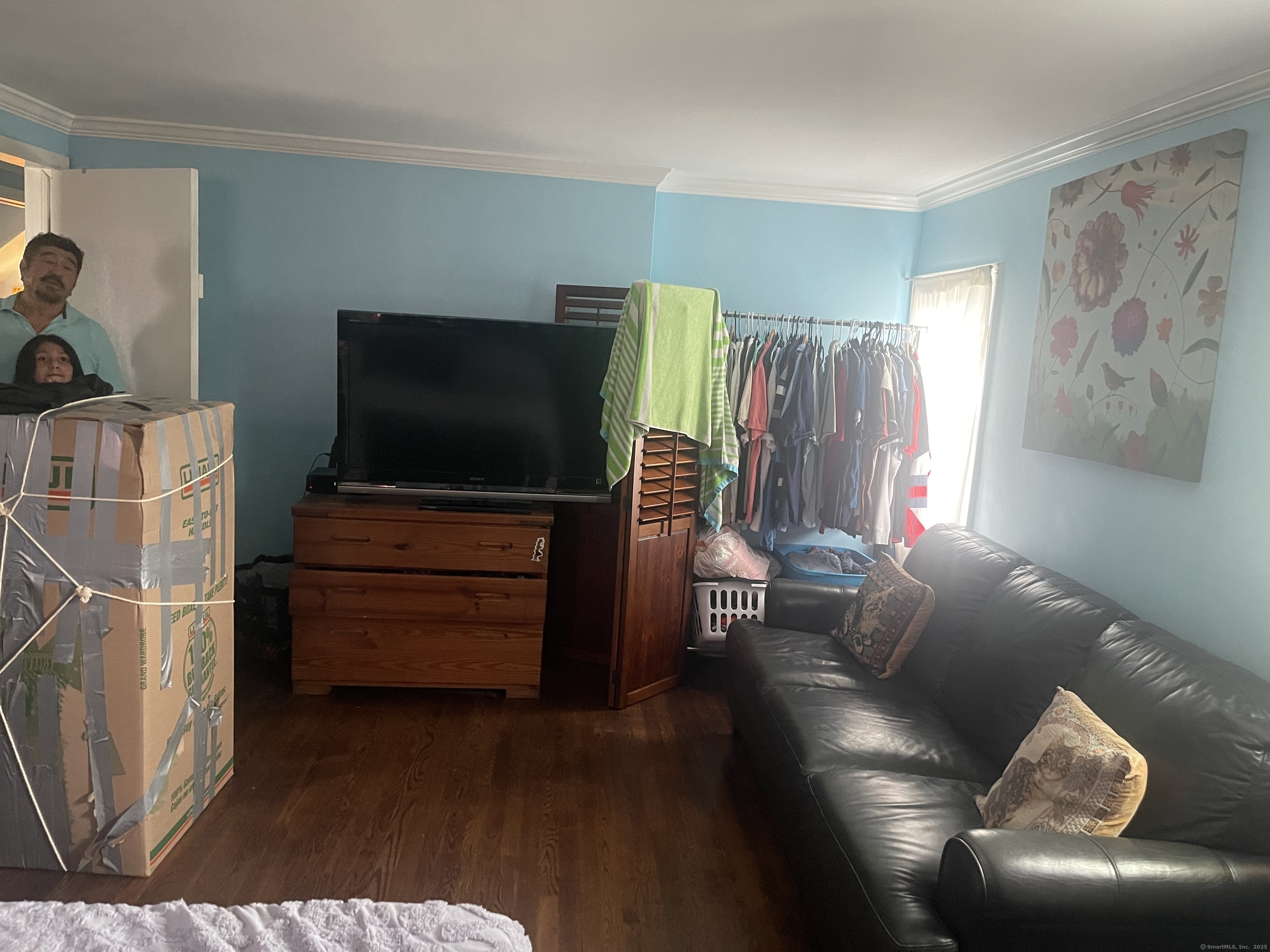 95 Frederick Street Stamford, CT 06902 - Photo 23 of 30 a living room with furniture and a flat screen tv