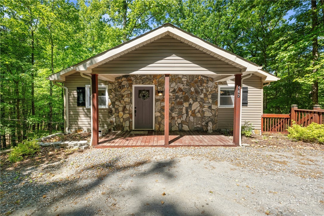 467 Horseshoe Ridge Road East Deep Gap, NC 28618 - Photo 2 of 46 a front view of a house with a porch