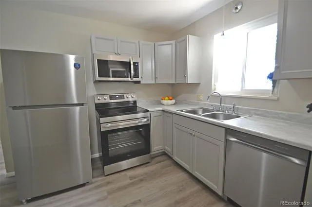 a view of an empty room with racks on the wall