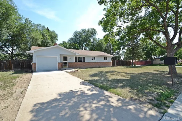 a house view with a backyard space