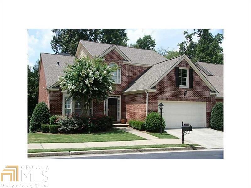 All brick beauty in popular gated Ashworth within walking distance to Dunwoody Village and only 1 mile from Perimiter Mall!