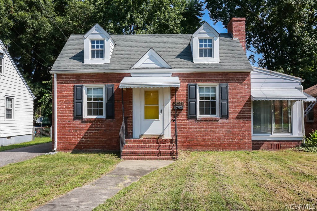 1806 Hilliard Road Henrico, VA 23228 - Photo 1 of 28 a front view of a house with a yard