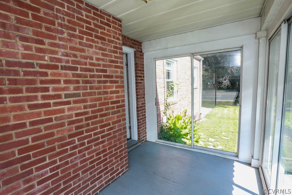 1806 Hilliard Road Henrico, VA 23228 - Photo 24 of 28 a view of a brick wall with a large window