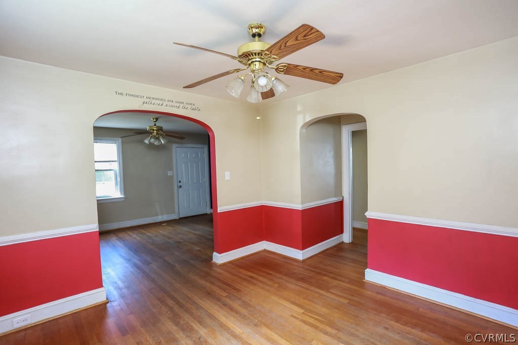 1806 Hilliard Road Henrico, VA 23228 - Photo 7 of 28 a view of an empty room with wooden floor and a ceiling fan