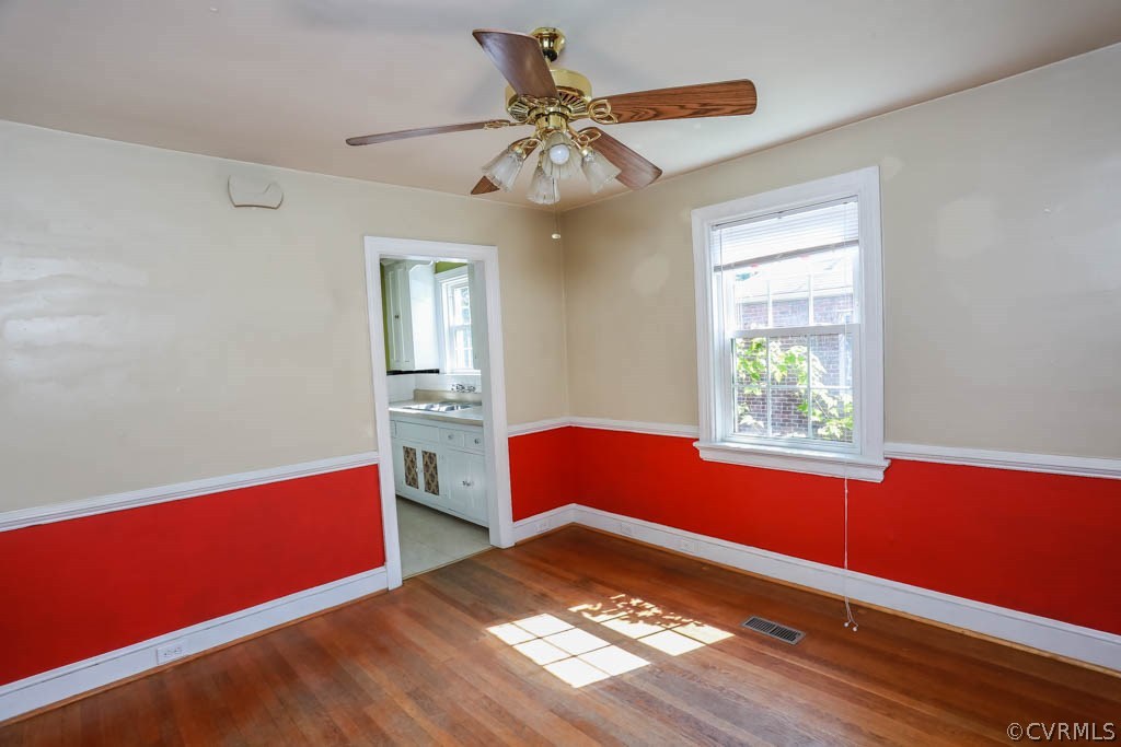 1806 Hilliard Road Henrico, VA 23228 - Photo 8 of 28 a living room with hard wood floors and a window