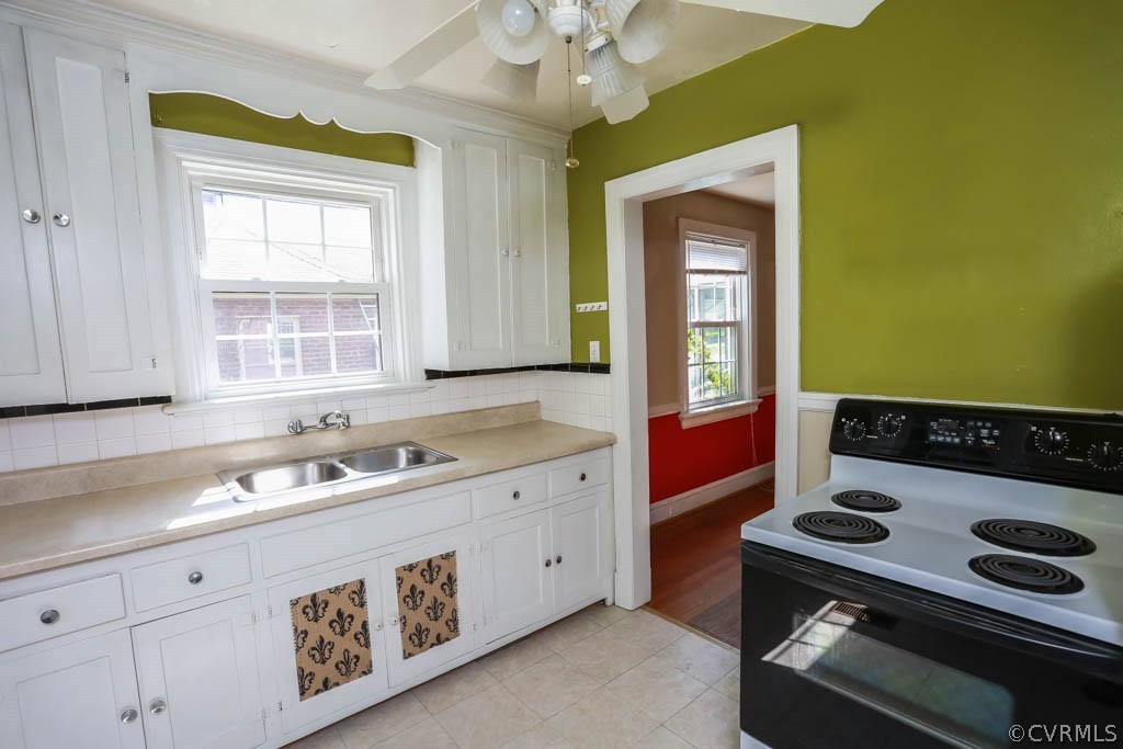 1806 Hilliard Road Henrico, VA 23228 - Photo 9 of 28 a kitchen with a stove and a sink