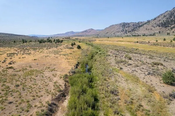 a view of ocean and mountain