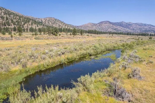a view of lake with mountain