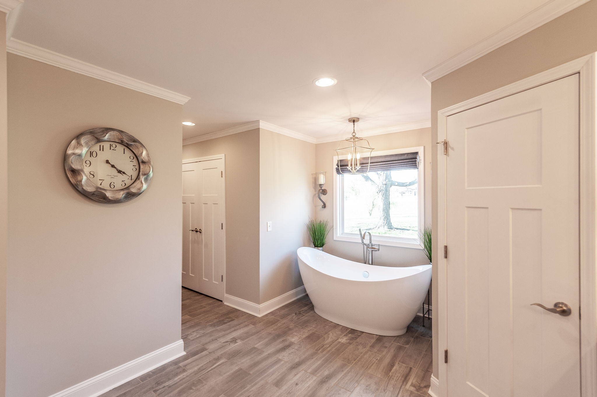 533 Lee Road Cottontown, TN 37048 - Photo 32 of 84 a spacious bathroom with a white tub and shower