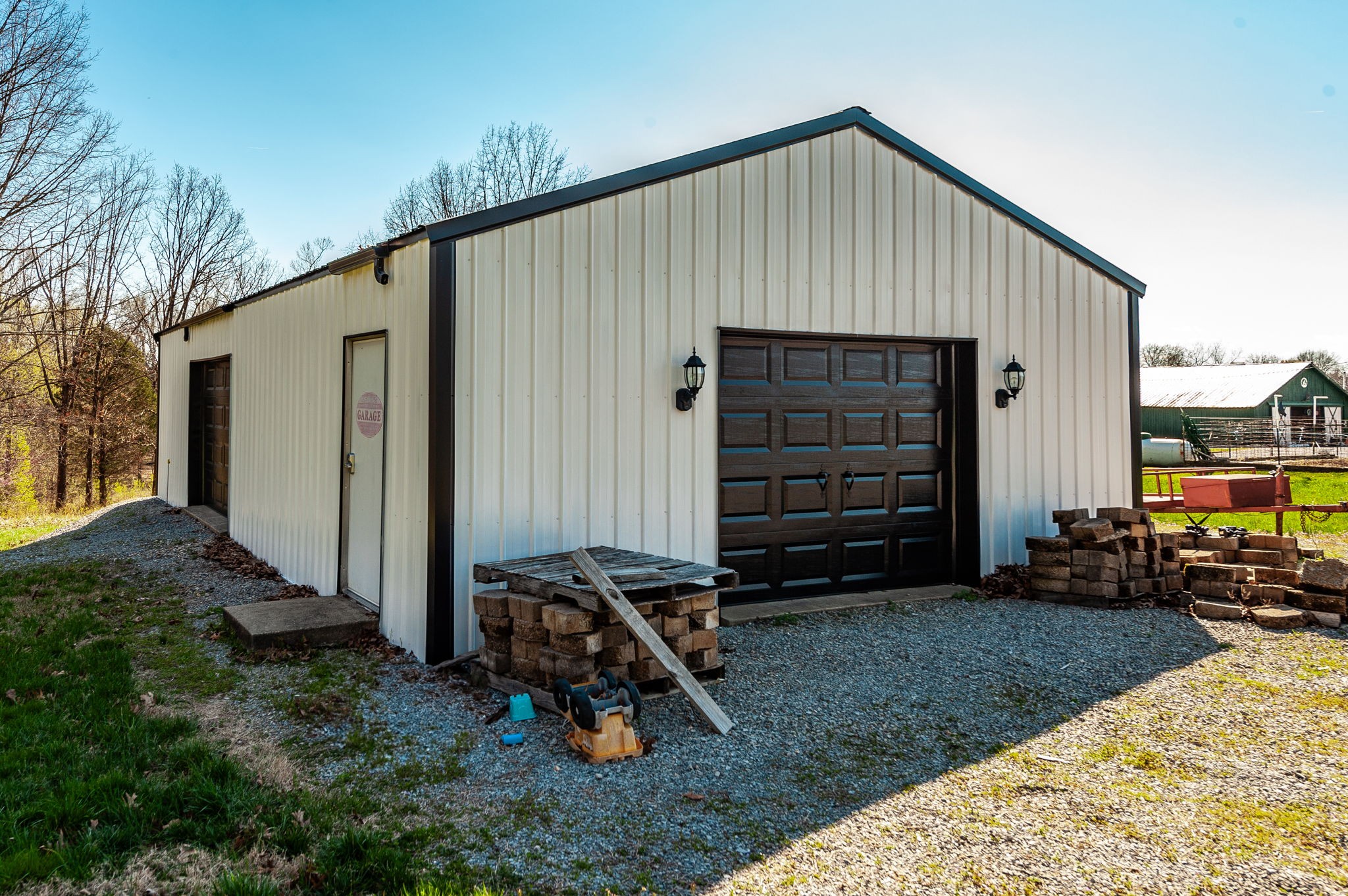 533 Lee Road Cottontown, TN 37048 - Photo 62 of 84 a backyard of a house with barbeque oven table and chairs