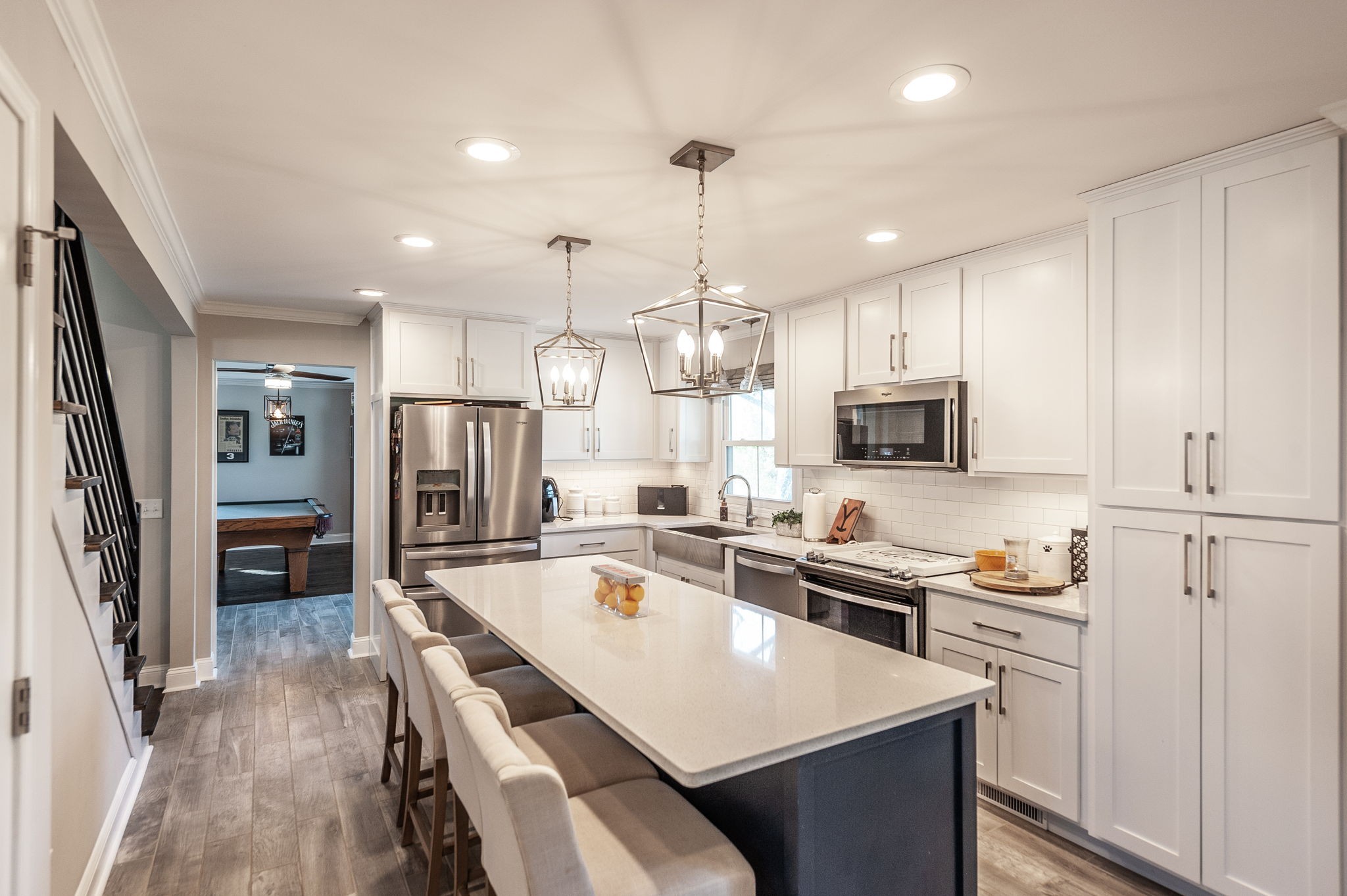 533 Lee Road Cottontown, TN 37048 - Photo 9 of 84 a kitchen with white cabinets and stainless steel appliances