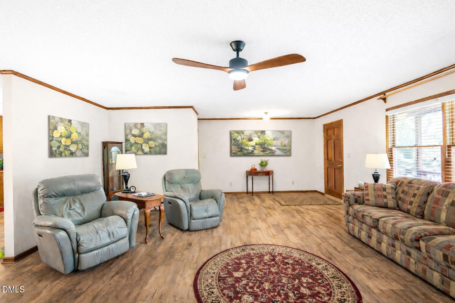 370 Log Barn Road Pittsboro, NC 27312 - Photo 15 of 54 40 LR with wall art