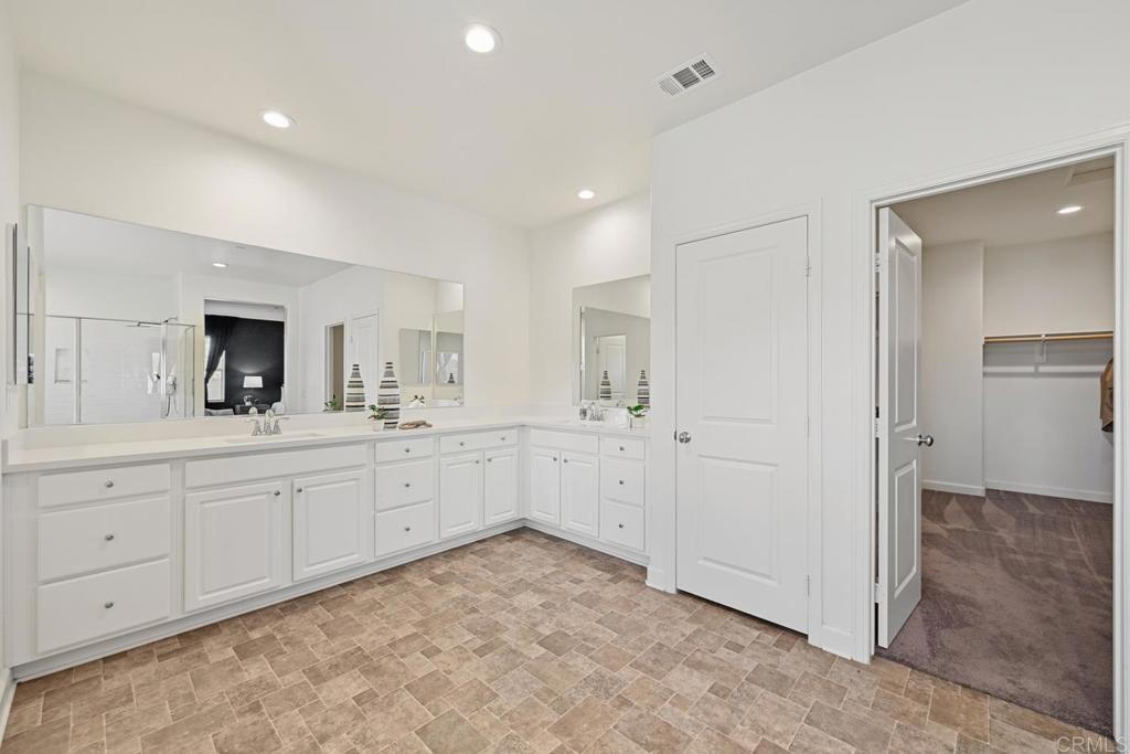 4634 Silent Knoll Drive Fallbrook, CA 92028 - Photo 20 of 26 a large white room with mirrors
