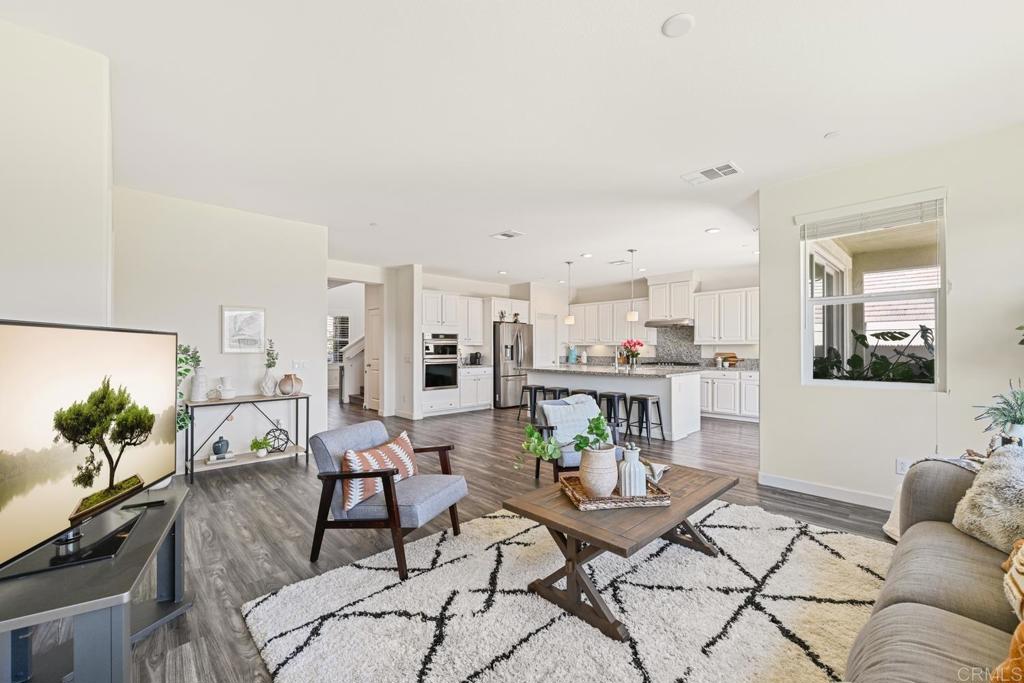 4634 Silent Knoll Drive Fallbrook, CA 92028 - Photo 5 of 26 a living room with furniture and view of kitchen